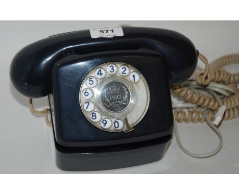 A vintage wall-mounted telephone Condition Report: Available upon request