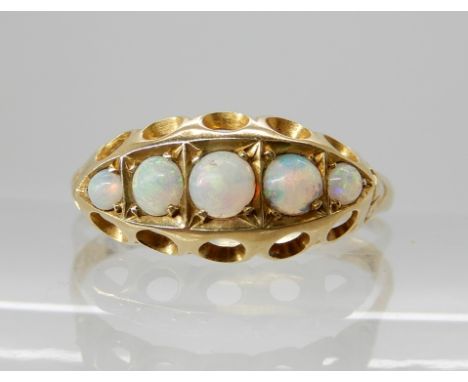 An 18ct gold five opal ring dated Chester 1910, size W1/2, weight 2.2gms Condition Report: Available upon request