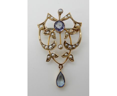 A 9ct gold aquamarine and pearl Edwardian pendant brooch, dimensions 4cm x 2.4cm, weight 2.8gms Condition Report: Rain inclus