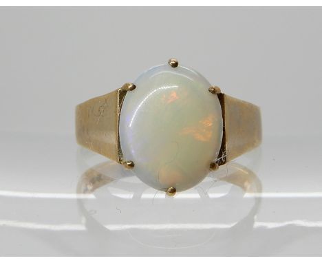A 9ct gold opal set ring, size N, weight 2.3gms Condition Report: Available upon request