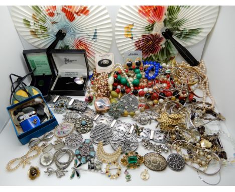 An Edwardian metal belt, a Miracle pendant, fans and a collection of vintage costume jewellery Condition Report: Not availabl
