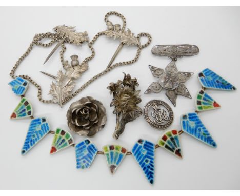 A white metal thistle cloak clasp, a partial Danish style ceramic necklace and other items Condition Report: Not available fo