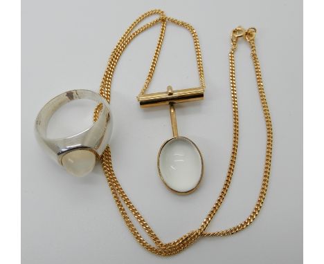 A 9ct gold moonstone pendant and chain length of pendant 3.2cm, length of chain 46cm, weight 8.6gms, together with a similar 