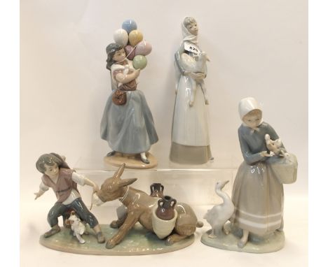 A Lladro figure group of a boy pulling a donkey and three others including a girl selling balloons, woman with lamb and girl 