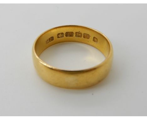 A 22ct gold wedding ring, size Q, weight 5.9gms Condition Report: Available upon request