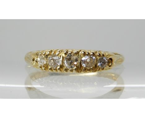 An 18ct gold five stone diamond ring with scroll mount, estimated approx combined diamond weight 0.20cts, finger size P, weig