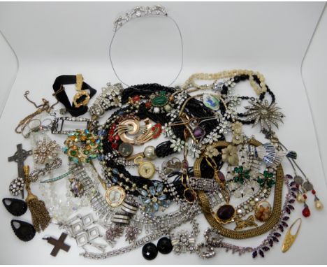 A collection of vintage costume jewellery to include, Trifari retro pendant and a Corocraft brooch Condition Report: Not avai