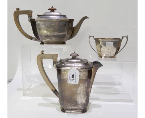 A silver teapot by Harrison Bros and Howson (George Howson), Sheffield 1936, with matching hot water pot and sugar bowl, of t