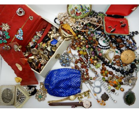 A large collection of vintage costume jewellery to include fish earrings, a compact, beads earrings etc Condition Report: Not