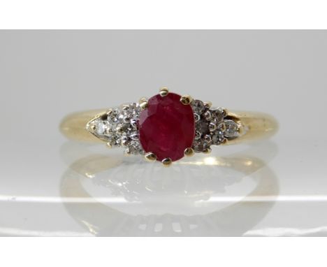 A 9ct gold ruby and diamond ring, size L1/2, weight 2.4gms Condition Report: Available upon request