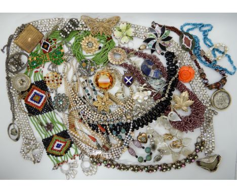 A collection of vintage costume jewellery to include, a ballerina brooch by Equisite, a pair of Trifari earrings and other it