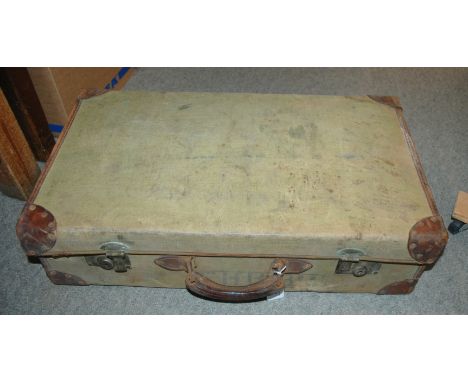 A vintage canvas and leather suitcase Condition Report: Available upon request