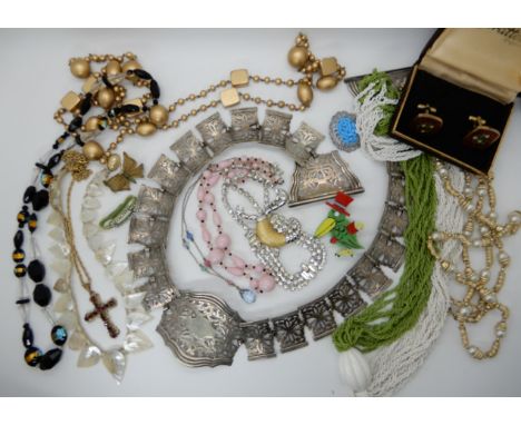 A collection of vintage costume jewellery to include, retro Stratton cufflinks, an EPNS belt, and other items Condition Repor