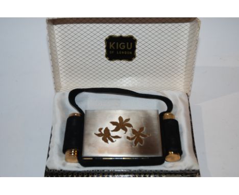 A Kigu of London compact in original box and circular cameo style plaque (2) Condition Report: Available upon request