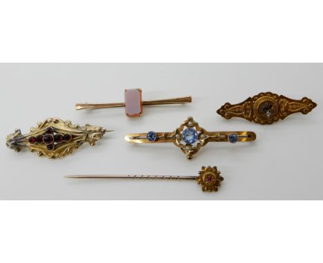 A 9ct blue gem and pearl brooch 4.9cm, a 9ct gold brooch set with a carnelian 4.8cm, two other brooches and a 9ct ruby set pi