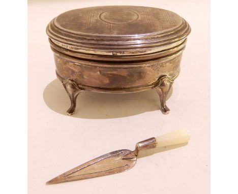 A silver jewellery box, Birmingham 1912, 8cm x 5.5cm with a bookmark modelled as a trowel with mother of pearl handle (2) Con