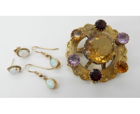 A yellow metal Scottish style brooch mounted with citrines, amethyst and garnet, weight 25.9gms and two pairs of 9ct gold opa