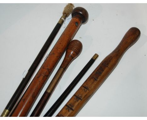 Three various ram rods, measuring stick and two walking canes (6) Condition Report: Available upon request