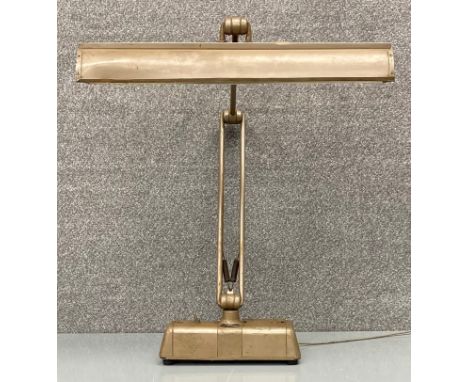 A mid century Linora Spotline industrial style articulated metal table/desk lamp. H.62cm