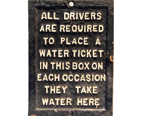 Water Column cast iron plate curved to fit the water column. Text reads 'Al Drivers Are Required To Place A Water Ticket In T