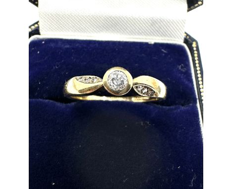 9ct gold diamond ring set with single stone diamond  &amp; diamond shoulders weight 2.1g .16ct diamond