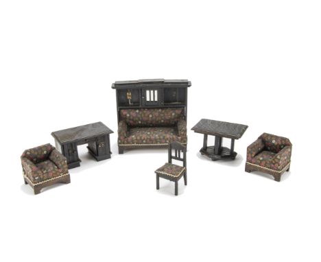 A German Arts & Crafts-style  Dolls' House Set, shelf-backed settle --5½in. (14cm.) high, two arm chairs and chair with dark 