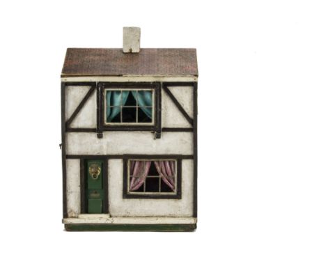 A small Tri-ang Wooden Size A  Dolls' House,  rough-cast and timbered façade, green front door with lion head knocker and 'Le