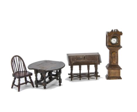 Dolls' House Furniture, an interesting oak gate legged table --2½in. (6.5cm.) high, hand carved solid oak long case clock, E