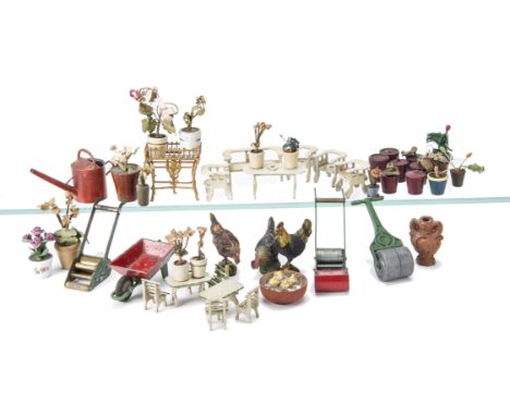  Dolls' House Gardening, red painted lead watering can --2in. (5cm.) high, two steel working lawn mowers, garden roller and w