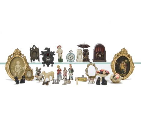 Miniatures and Novelties, two celluloid fruit basket and bowl tape measures; two lead bears under umbrella, pencil sharpeners