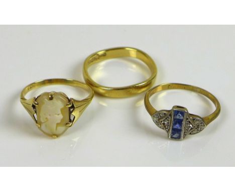 A collection of three 9ct gold rings, one Art Deco set with sapphires, size O, one set with shell cameo, size N, and third of