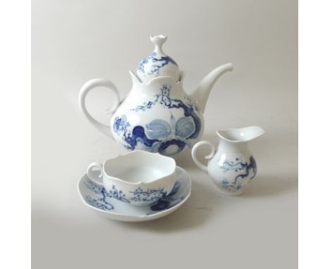 A Meissen porcelain part tea set, decorated in the Blue Orchid pattern, comprising a tea pot, one tea cup and saucer, and a m