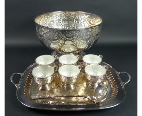 An Elizabeth II silver plated punch bowl complete with six cups and a ladle all in Kings Royale pattern, by Viners of Sheffie