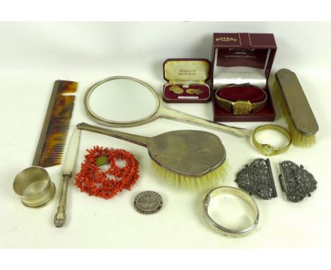 A collection of vertu and costume jewellery, including a white metal nurse's belt buckle, a Victorian silver cuff bangle, a V