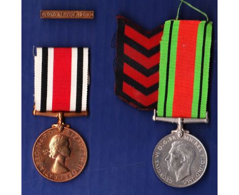 Special Constabulary Long Service medal EIIR (D) with Long Service, 1969 clasp named to John R. Baker, Thornham Norfolk with 