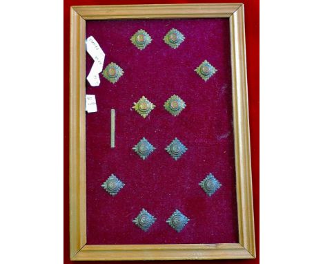  WWI Plaque of British Officers pips (12) with an original officer wound badge. Two variations of pip, one brass with enamel 