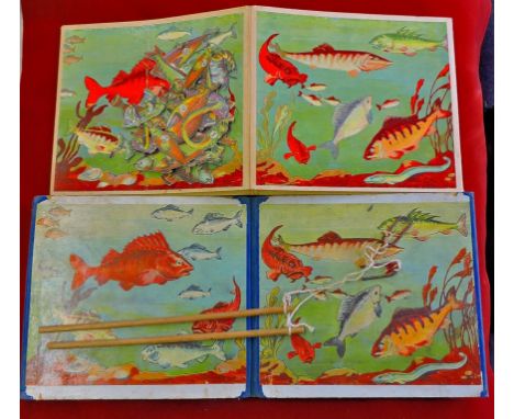 A vintage Fishing Game Two 'fish tanks' with numbered fish, two rods with magnets to catch them. Used but generally fine.