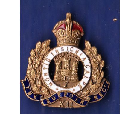 The Suffolk Regiment (XII Battalion) Sweetheart badge, WWI Period made of brass with blue, red and white enamel facing. A sca