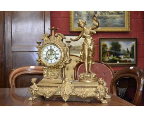 An Ansonia gilt metal figural mantel clock, enamelled chapter ring, Roman numerals, visible escapement, caryatids to angles o