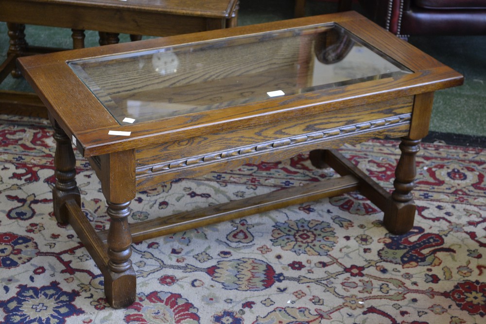 An Old Charm Glass Top Display Coffee Table