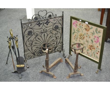 Fireside furniture - a pair of Andirons; a fire screen, another embroidered; a companion set 
