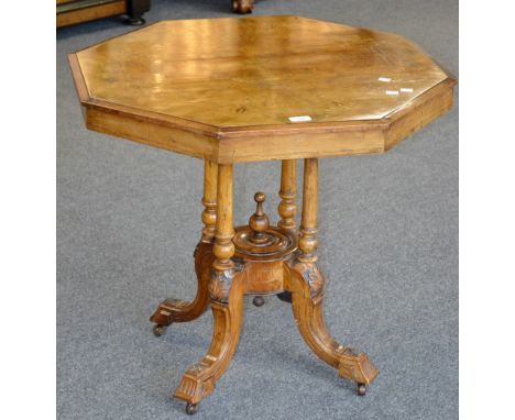 A Victorian octagonal occasional table, walnut quarter veneered top inlaid with satinwood leafy scrolls, four turned column s