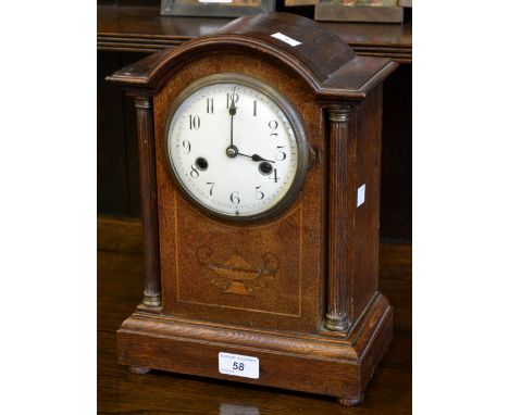 An inlaid Edwardian oak mantel clock C1910