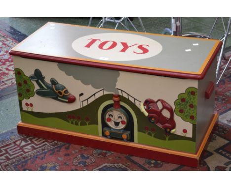 A toy box decorated in relief with Thomas the tank engine etc.