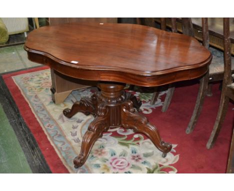 A Victorian mahogany centre table, serpentine top, four drawers to cockbeaded frieze, turned column, acanthus carved socle an