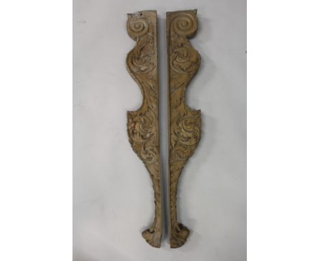 A GOOD PAIR OF DOUBLE SIDED CARVED WOOD BRACKETS, 3ft 8ins long, carved with acanthus, scrolls and lion finial. 