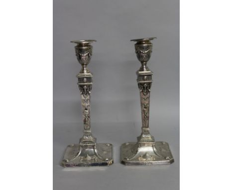 A GOOD PAIR OF VICTORIAN ADAM DESIGN CANDLESTICKS. Sheffield 1898. Makers R. M. and B. H. 12ins high. 