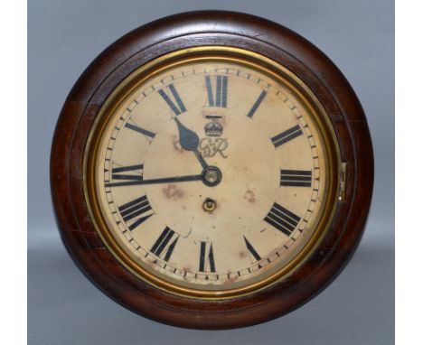 A SMALL GEORGE VI 7.5-INCH WALL CLOCK in a mahogany case. 