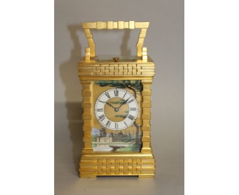 A SUPERB 19TH CENTURY FRENCH BRASS REPEATER CARRIAGE CLOCK with unusual enamel dial depicting a castle, lake, boat and tree. 