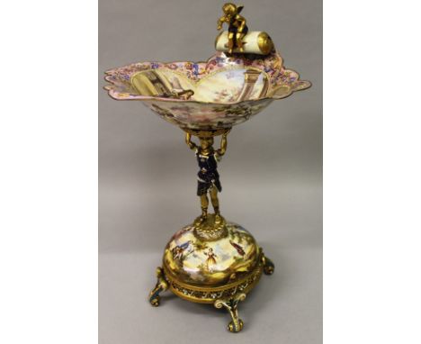 A SUPERB LARGE VIENNA ENAMEL SHELL SHAPED COMPORT, the shell held aloft by a classical figure, the bowl and the base painted 
